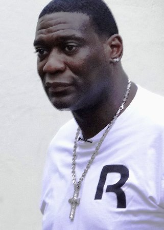 Police claim that former Sonics player Shawn Kemp was detained in connection with a drive-by shooting.