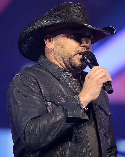 Jason Aldean's show is cut short due to heat exhaustion on stage.
