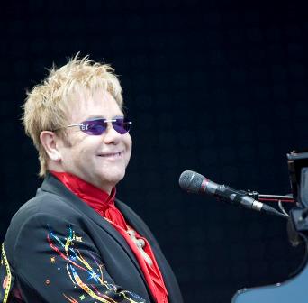After collapsing at his house in Nice, France, Elton John spends the night in the hospital.